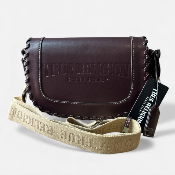 True Religion Handbags - True Religion Wine Crossbody with guitar strap and beautiful whip stitch. NWT